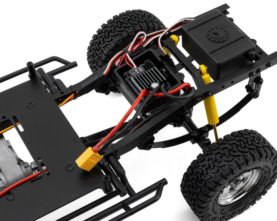 1 rc4wd 1/24 scale trail finder 2 crawler and a team associated 1/28 hot scale short