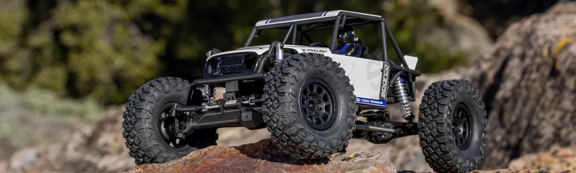 Vanquish Products H10 Optic 1/10 4WD RTR Brushless Rock Crawler (Sparco V2) Banner Image
