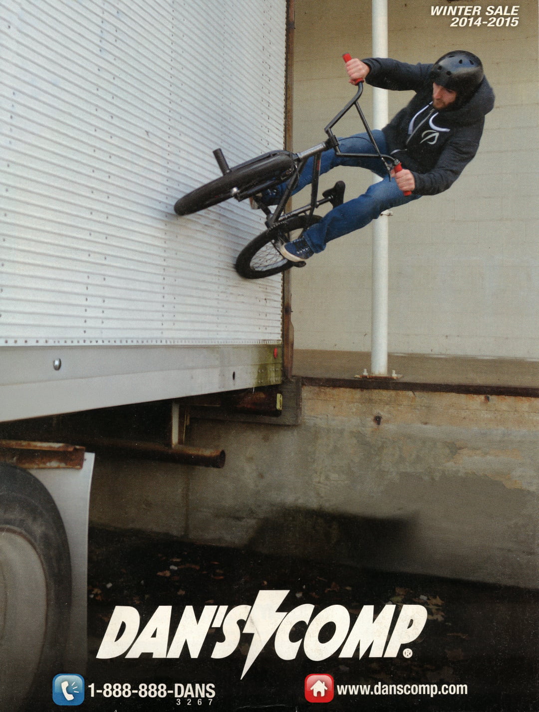 Dan's employee Michael doing a wall ride on a semi trailer on the cover of a Dan's Comp catalog in 2014.