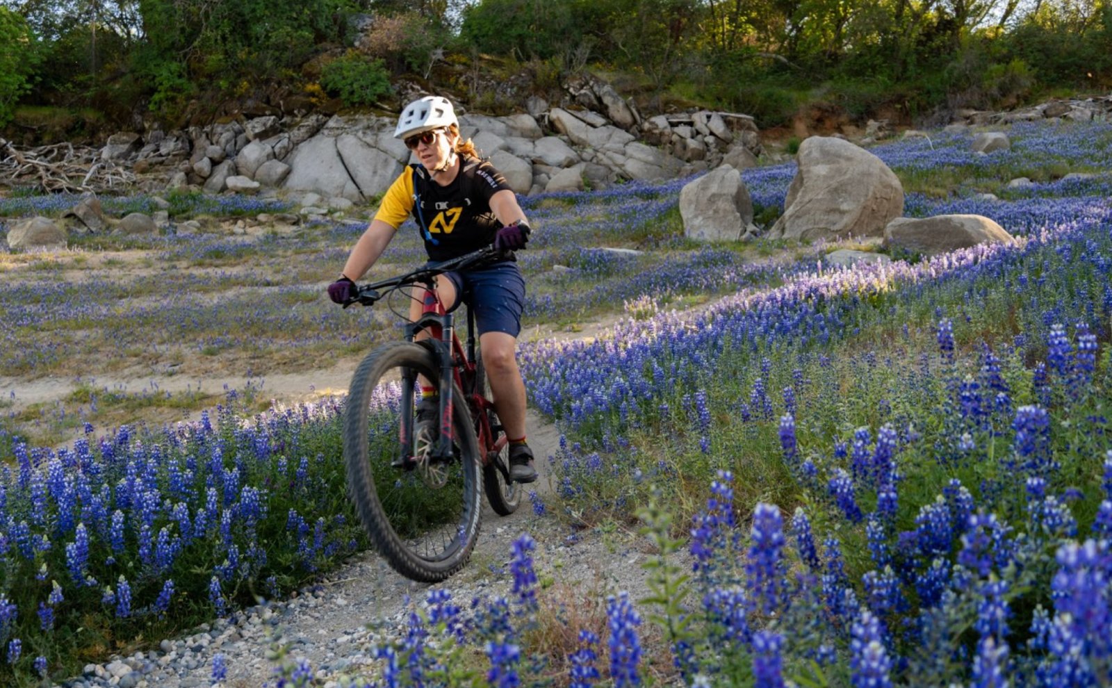 Ashley riding the Vittoria tires on sandy terrain.