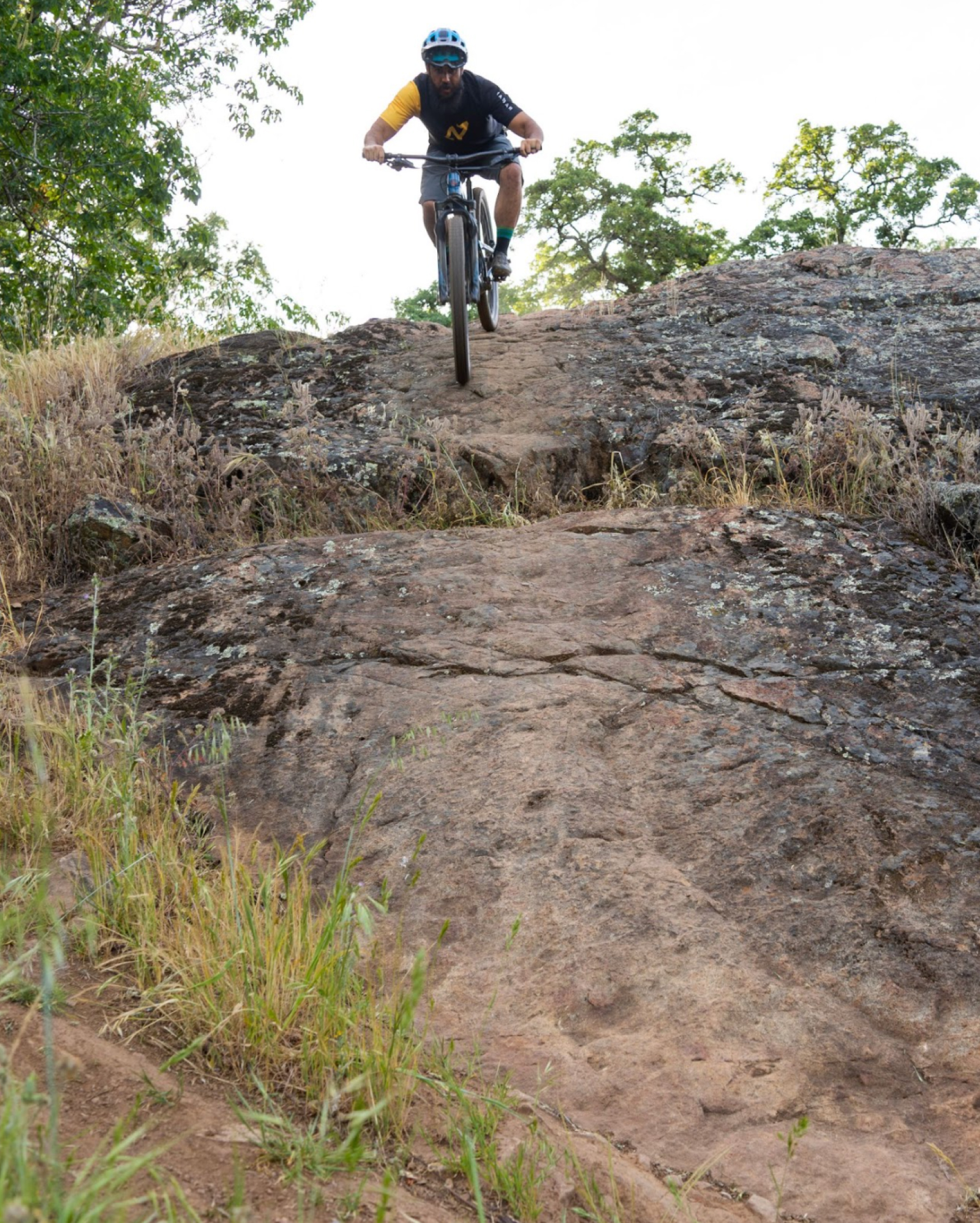 Nathan testing the grip of the Vittoria tires on a steep rock face.