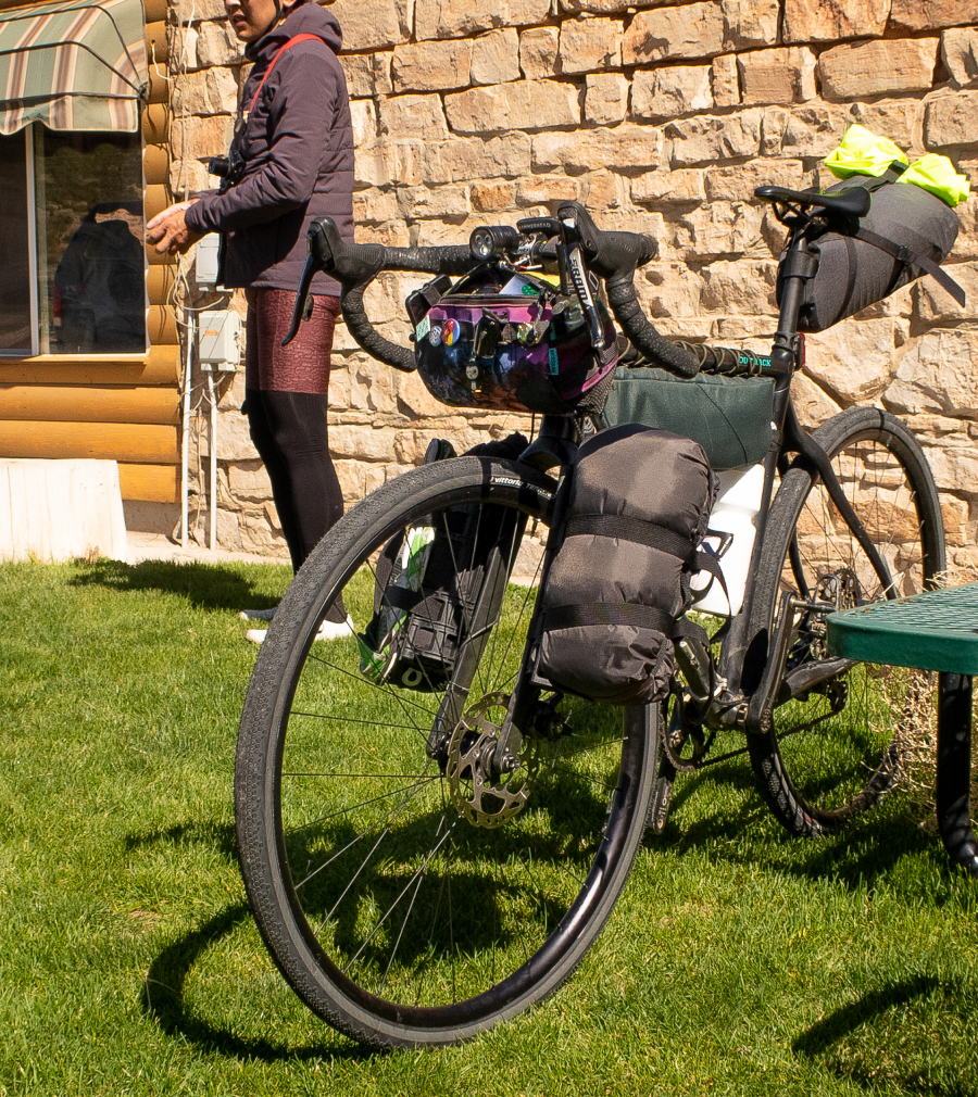 gravel bike packed with camping gear