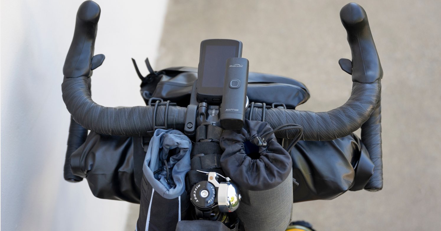 Bike handlebars with bikepacking gear