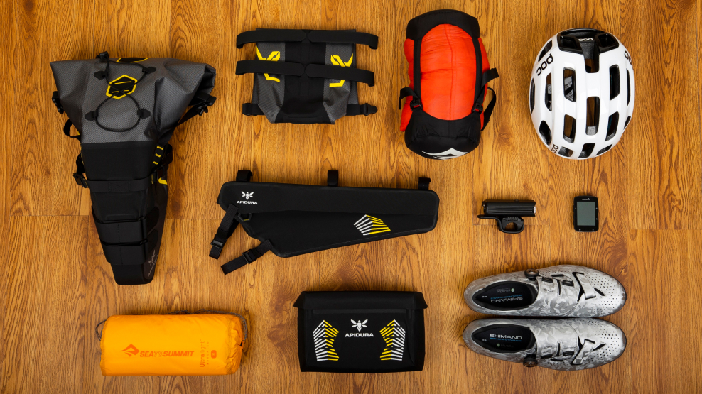 Packing your bags, cycling items laying on the floor