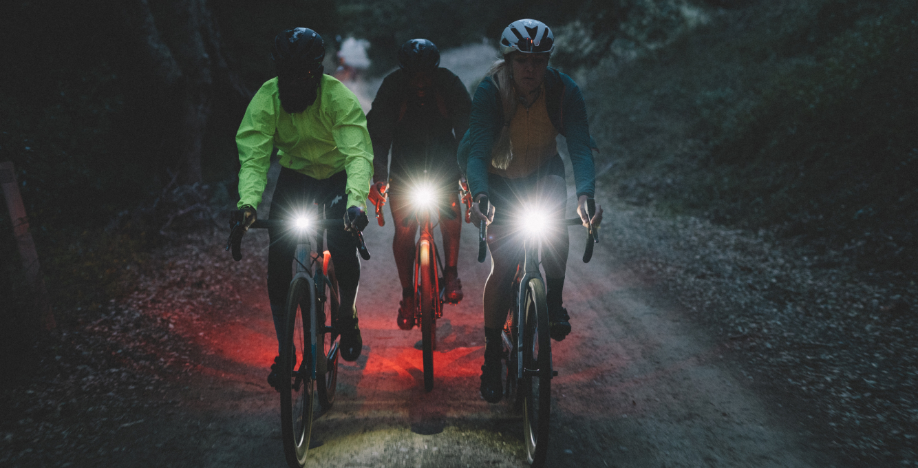 cyclists riding at night with headlights