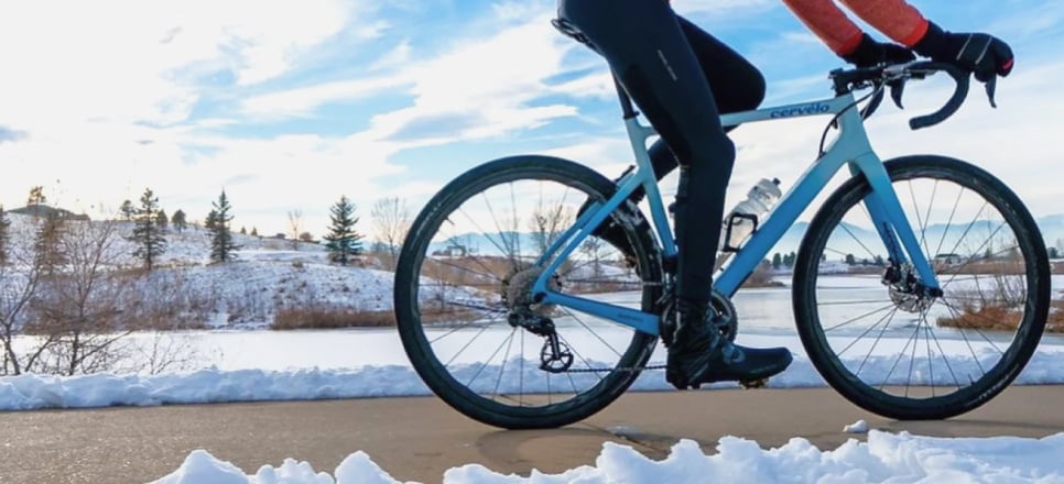 Merino: The Best Winter Socks, cyclist in snowy weather