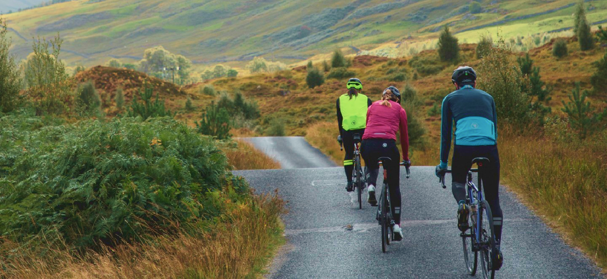 Merino Wool Top Picks - cyclists on road in cold weather clothing