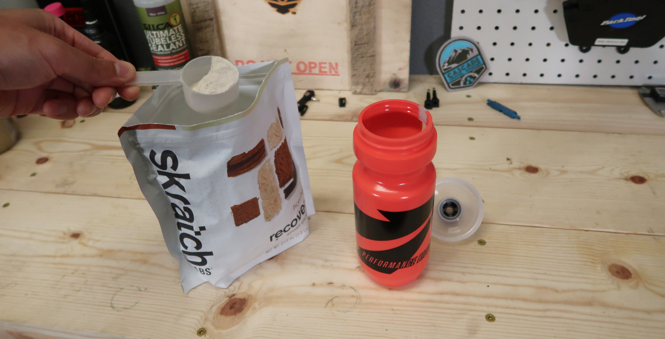 Skratch Recovery Drink mix and Performance Bicycle water bottle