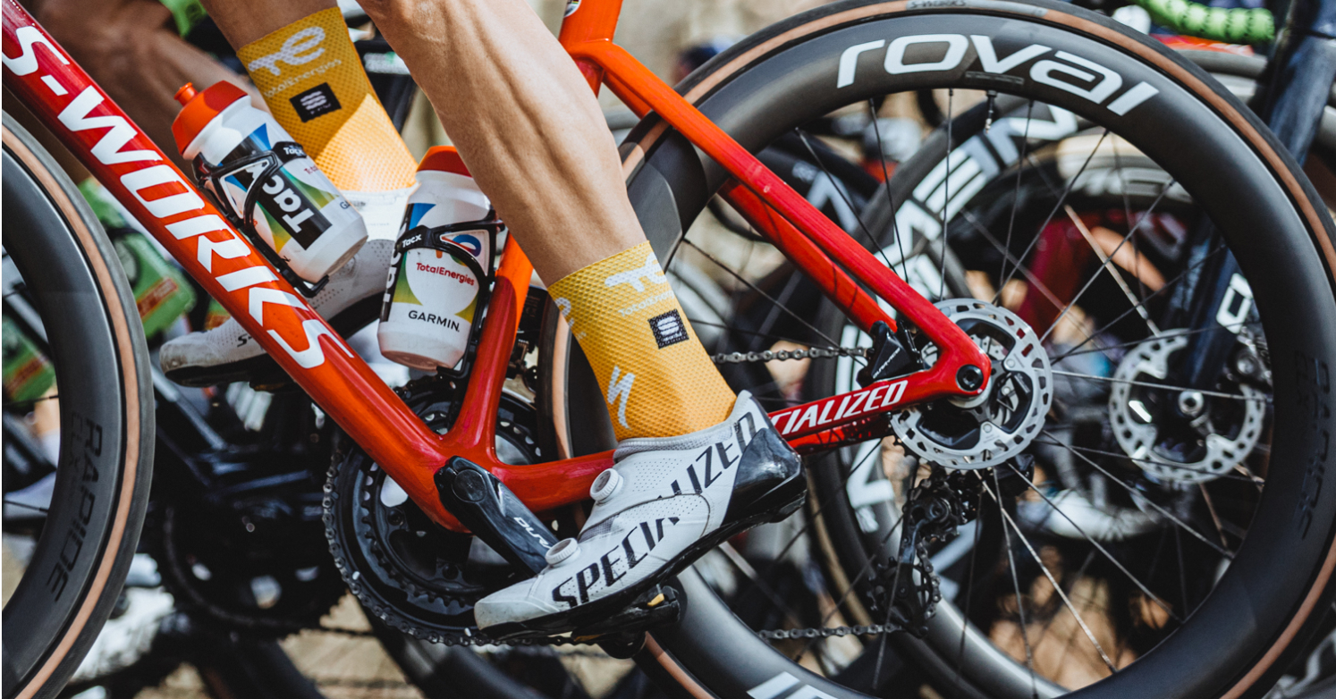 Tour Cyclist riding in group close-up view