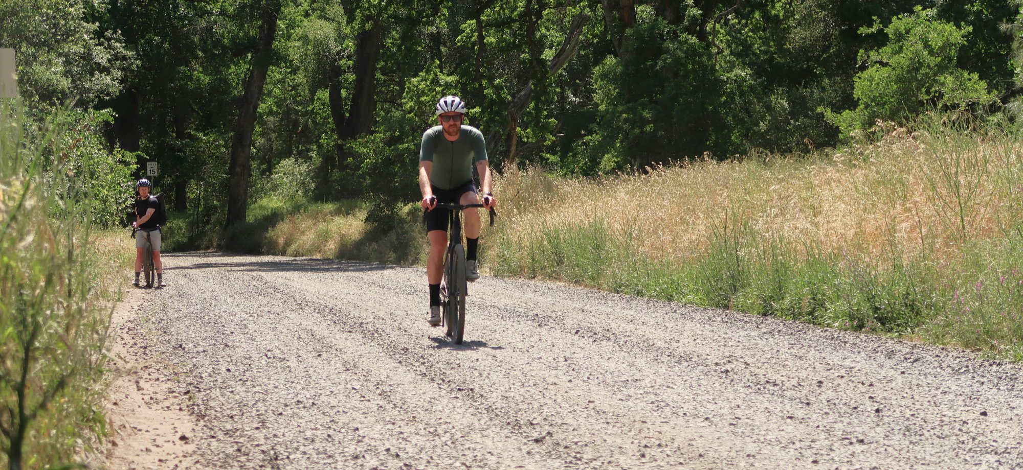 Gravel cyclist riding on bike trail
