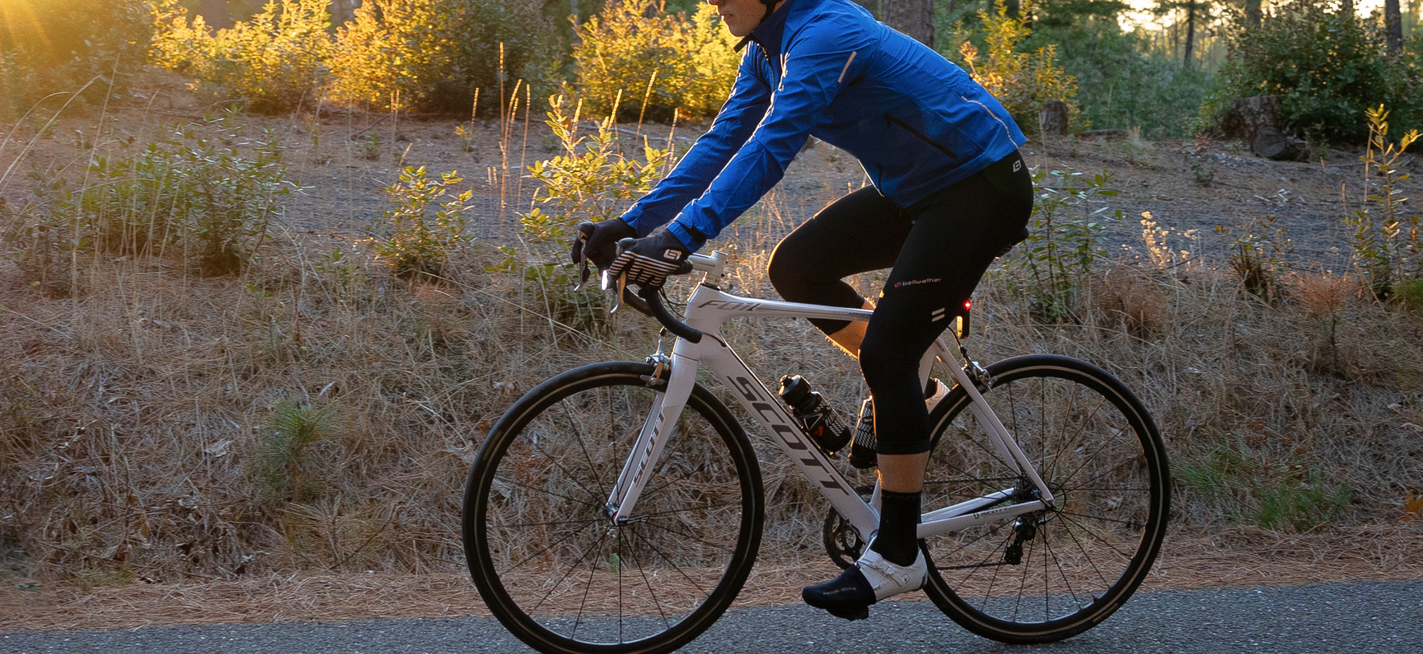 Staff Favorites: Winter Layering - cyclists on road in cold weather clothing