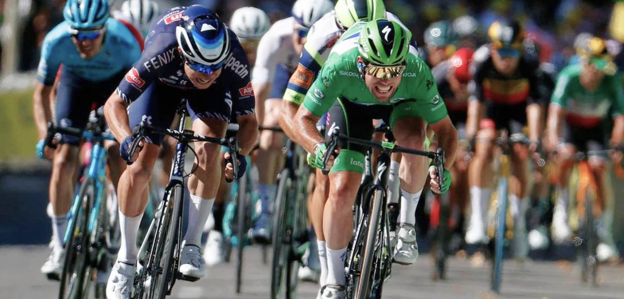 Mark Cavendish leading a group sprint at the 2021 Tour de France