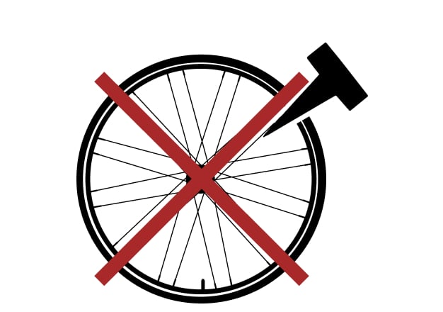 Graphic of thorn puncturing tire