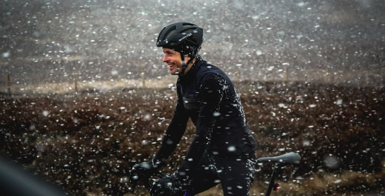 cyclist riding in the snow