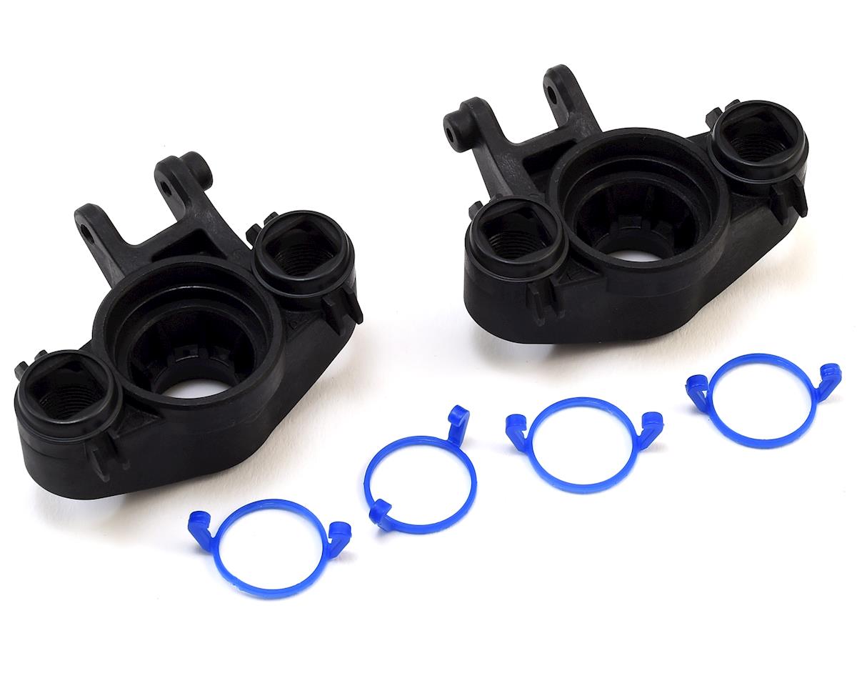 Traxxas Axle carriers, left & right (1 each) (use with 8x16mm & 17x26mm ball bearings)/ dust boot retainers (4)  TRA8635