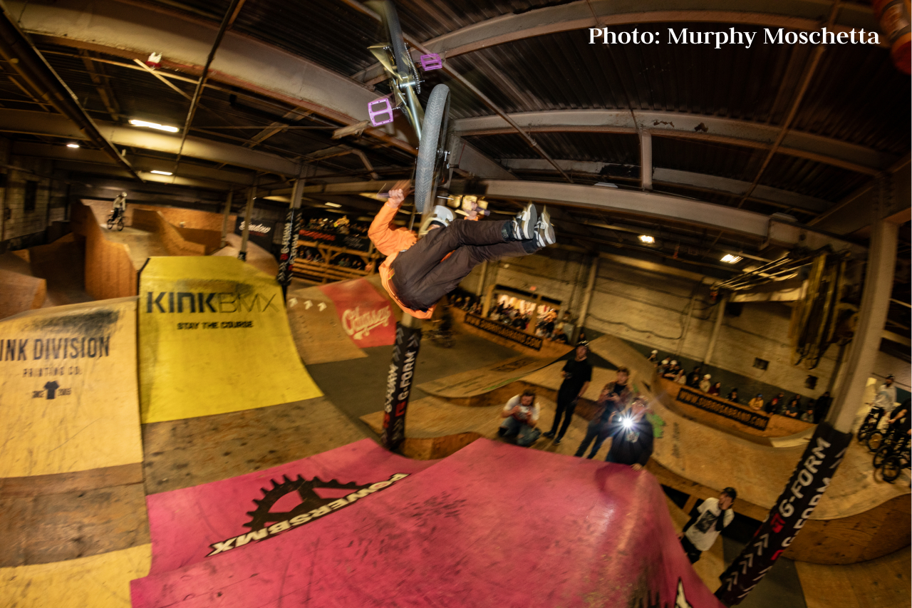 Aaden Reed doing a flipwhip at the Welcome Jam at the Wheel Mill Skatepark.