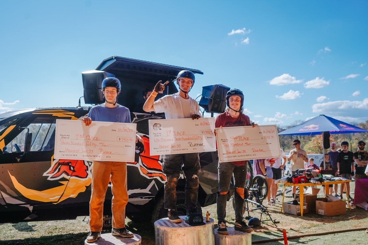 Dan's Comp Flow Team rider Jake Lord on the top step of the podium at the 2023 Harvest Fest at The Riveter Bike Park