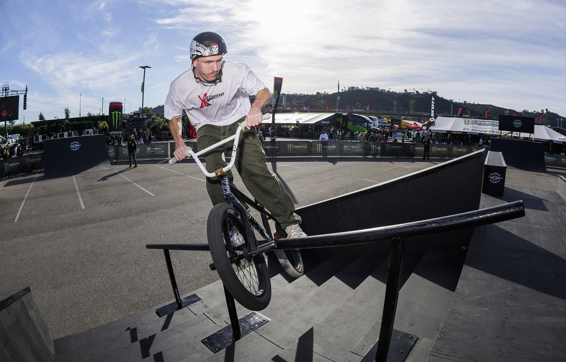 Jack Hennicke doing an uprail crank arm grings at the Monster Energy BMX street event at the San Diego supercross event.