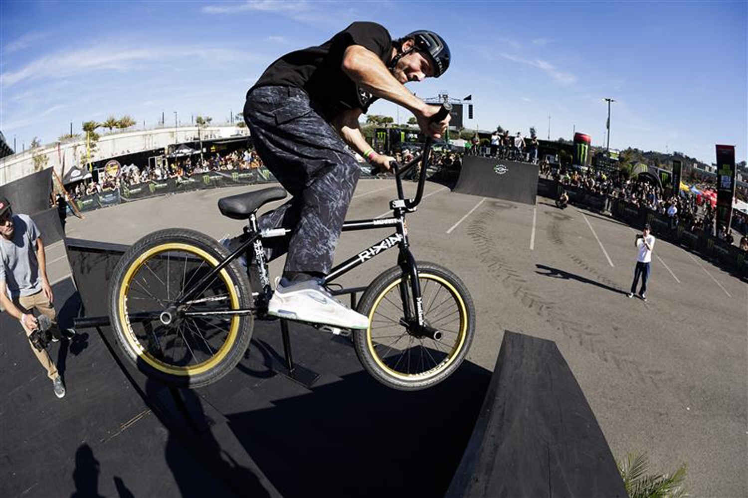 Dan Kruk grind to gring transfer at the Monster Energy BMX street event at the San Diego supercross event.